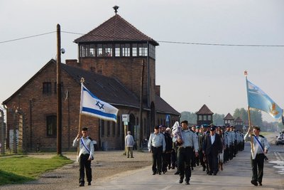 A group from Israel (not sure exactly what they were) marching out of Birkenau. They didn’t march well, no Teutonic goose step from these folk, but that was OK with us, we were excited to see them.